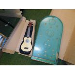 A boxed Everjoys Hawaiian ukulele, and a partially boxed bagatelle. (2)