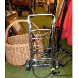 Wicker basket and a folding trolley.