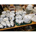 A comprehensive Noritake Ireland Trailing Ivy part dinner service, to include lidded tureens, dinner