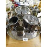 A silver plated serving tray, three piece British electro plate service, etc.