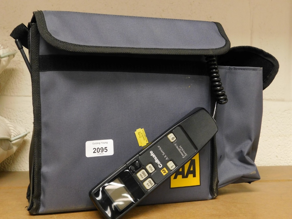 An AA call safe emergency services travelling phone in carry case.