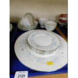 A Wedgwood Belle Fleur part service, comprising dinner plate, six side plates, four cups and five sa