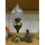 A Victorian brass oil lamp and Eastern style miniature copper kettle.