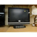 A Grundig Elegance 19" flat screen television and DVD player, with remote control.