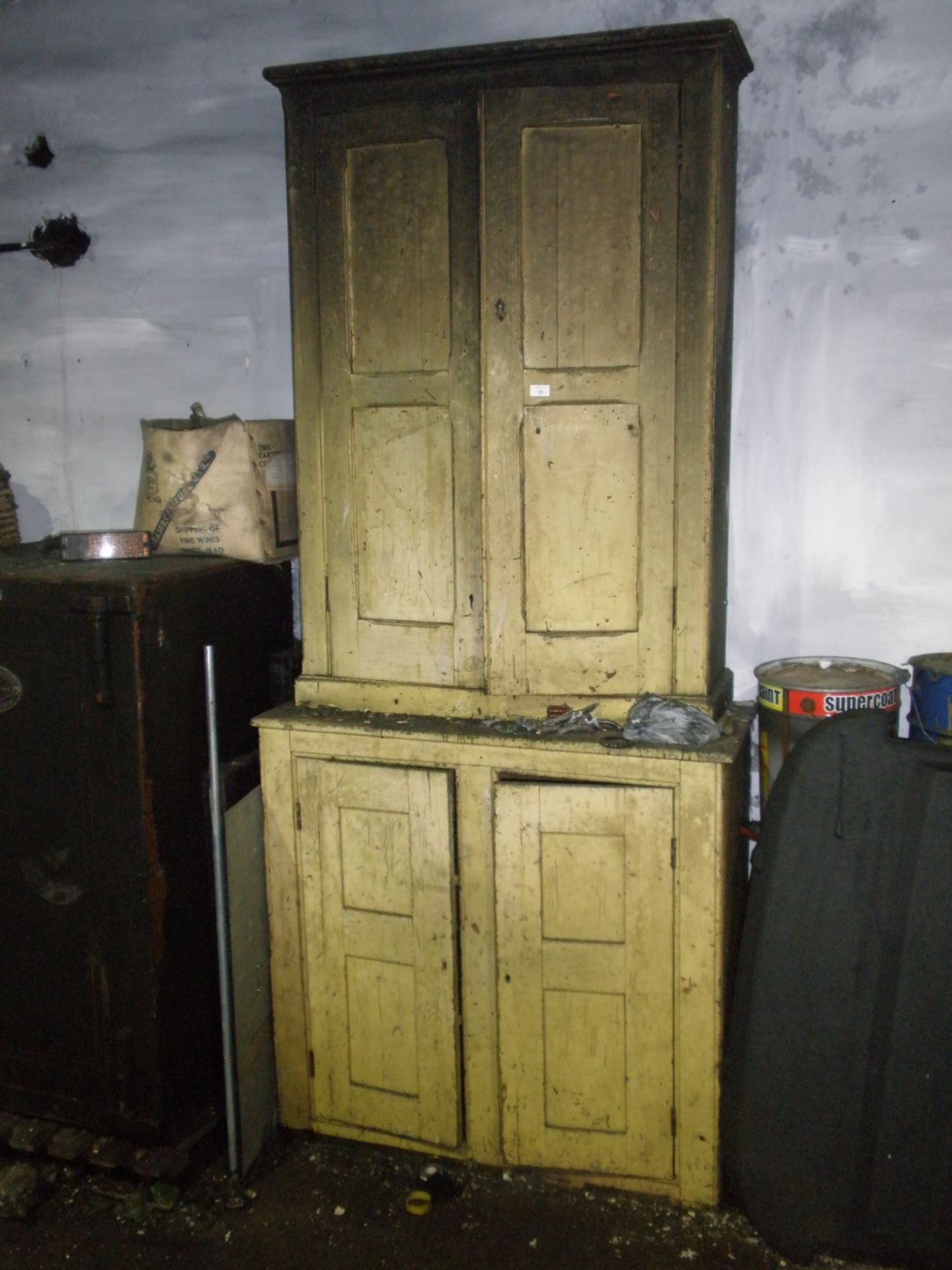 A Victorian painted pine cupboard.