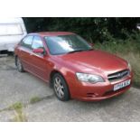 A Subaru Legacy, registration FP54 WJC, 62,609 miles, vehicle starts and has been run around the yar