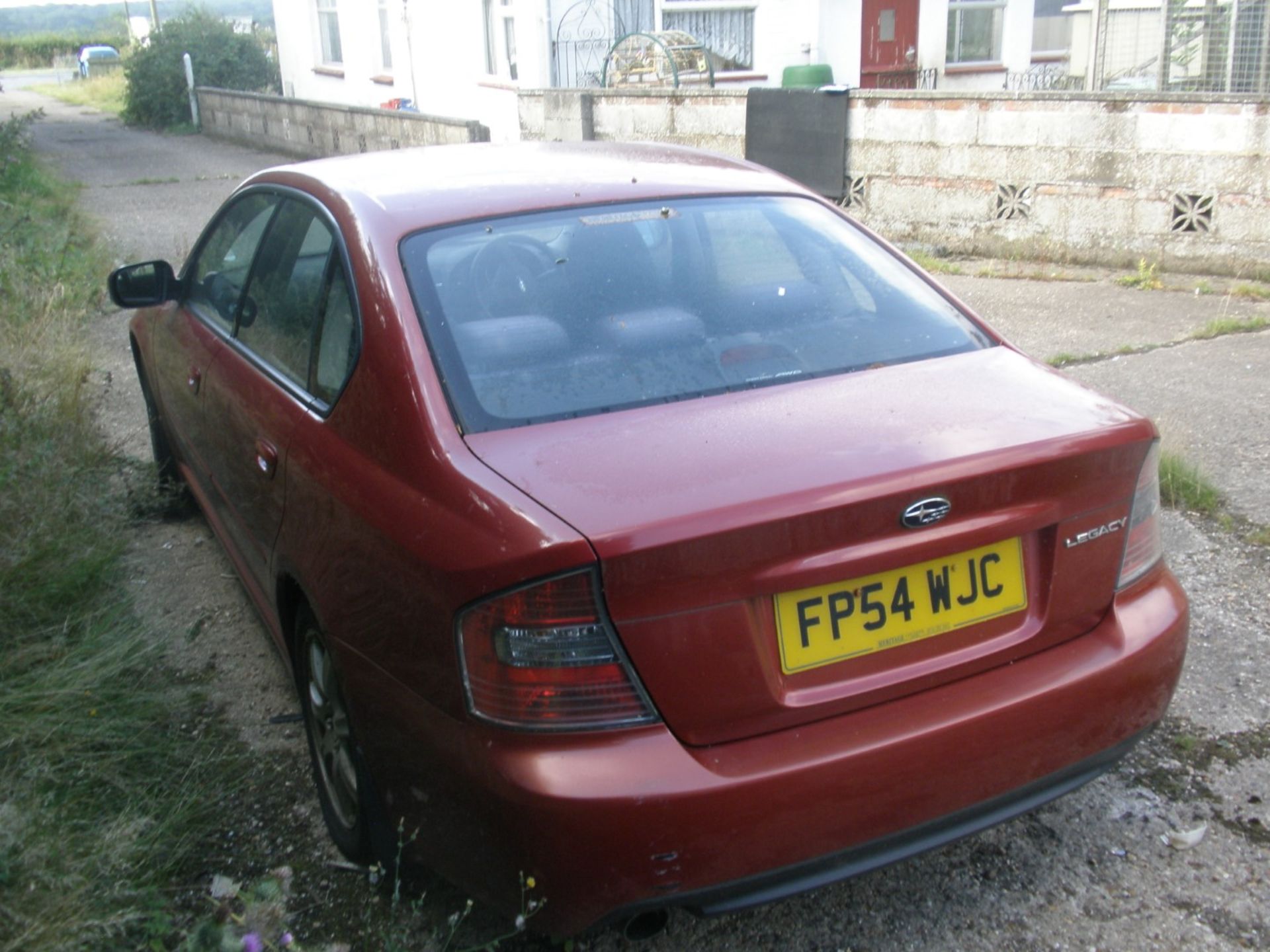 A Subaru Legacy, registration FP54 WJC, 62,609 miles, vehicle starts and has been run around the yar - Image 3 of 4