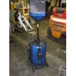 A Sealey sump oil drain trolley.