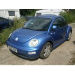 A Volkswagen Beetle, registration EK51 YBN, 115,206 miles. Vehicle has been started and driven arou