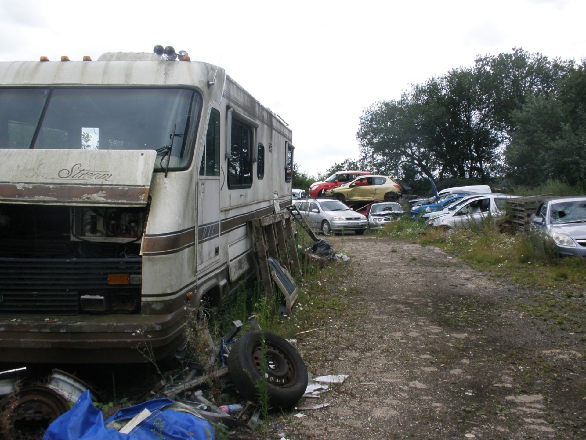 The Residual Scrap Vehicles on site together with other scrap hidden in the undergrowth. To include - Image 6 of 10