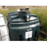 Two plastic oil tanks.