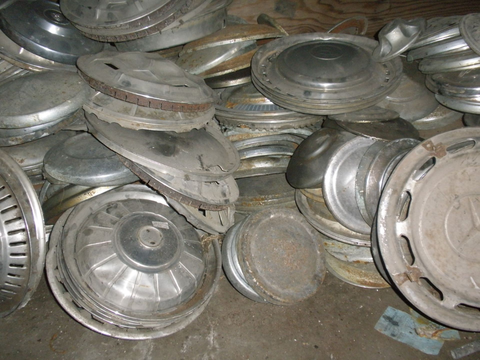 A large quantity of metal hub caps and wheel trims for classic cars, to includ Mercedes, Trimuph, Wo - Image 2 of 3