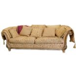 A large Chesterfield type sofa, upholstered in crewel work type fabric, red, gold, etc., with gilt s