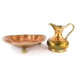 A group of copper and brassware, to include a copper and brass jug, with swing handle, 16cm high and