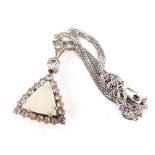 An Art Deco style pendant and chain, the triangle set pendant with a central opal surrounded by whit