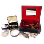 A jewellery box and contents of costume jewellery, to include hammered silver bangle, coin bracelet,