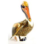 A Royal Crown Derby porcelain paperweight of a Brown Pelican, with gold coloured stopper, 12cm high,