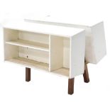 An Isokon Donkey bookcase, after the design by Errett Race (1913-1964), unmarked, (AF), 43cm wide.