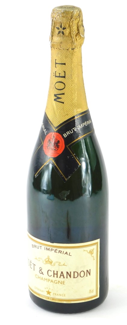 A bottle of Moet Imperial Brut champagne.