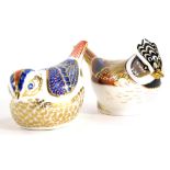 Two Royal Crown Derby porcelain bird paperweights, a goldcrest, with silver coloured stopper and a c