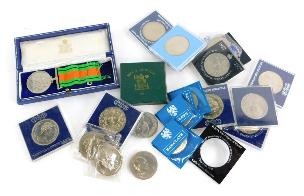 A quantity of Commemorative coins, a World War Two Defence Medal, etc.