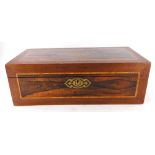 A rosewood and mahogany writing box, the top inlaid with a brass cartouche enclosing a fitted interi