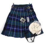 A gentleman's tartan kilt, with sporran, the kilt size 30-32, and a pewter kilt pin, modelled in the