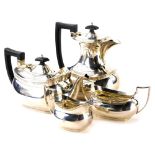 A George V silver four piece tea set, by Barker Brothers Silver ltd., of baluster form, comprising t