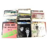 A collection of records, to include Sex Pistols, Never Mind the Bollocks albums, and twelve singles