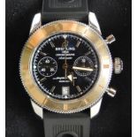 A gentleman's Breitling Super Ocean wristwatch, having a black dial with applied markers and subsidi