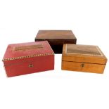 Three workboxes, a Victorian mahogany and pewter strung example, 29cm wide, a Victorian workbox with