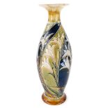 A Royal Doulton stoneware vase by Eliza Simmance, with incised decoration of irises and leaves withi