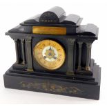 A late 19thC/early 20thC French black slate portico shaped mantel clock, with reeded Corinthian colu