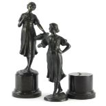 20thC School. Figures of ladies, one carrying a basket of fruit, bronze, each on a marble plinth, 30