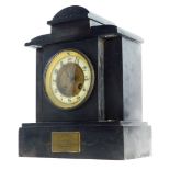 A late 19thC French black slate mantel clock, with presentation plaque, presented to a Coote by his