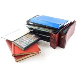A large quantity of world loose stamps, folders for First Day covers, etc.
