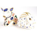 Two Royal Crown Derby porcelain paperweights, to include baby rabbit, with silver stopper, 6cm long,