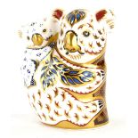 A Royal Crown Derby porcelain koala and baby paperweight, for the Australian collection, with gold c