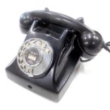 A Reliant Telephone Company vintage Bakelite telephone, A GEC subsidiary in black.