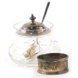A George V cut glass and silver topped jam or condiment pot, with a silver spoon, Sheffield 1931, an