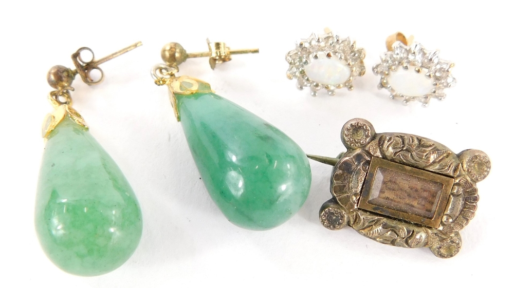 A small group of jewellery, to include a pair of jade drop earrings, a pair of opal and white stone
