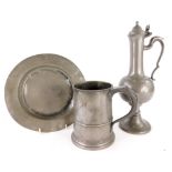 A group of pewter ware, to include a pewter one quart tankard, a RDME pewter platter with shield sta