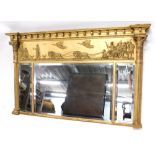 A 19thC overmantel mirror, the inverted breakfront frieze mounted with spheres above a panel depicti