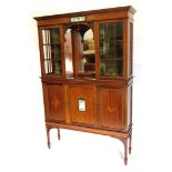 An Edwardian mahogany and satinwood display cabinet, inset with green Wedgwood style plaques, each d