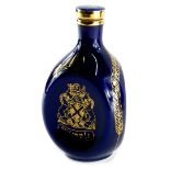 A bottle of Haig commemorative Whisky, in ceramic decanter, 75cl.