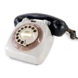 A GEC vintage grey plastic telephone.