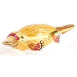 A Royal Crown Derby porcelain paperweight of a duck billed platypus, from the Australian Collection,