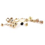 A group of 9ct gold and other earrings and loose earrings, to include knotted studs, hoop earrings,