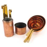 A selection of copper and brass, to include measure, skillet, etc.