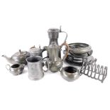 A collection of various pewter, to include pewter tankards with lids, toast rack, trays, teapot, etc